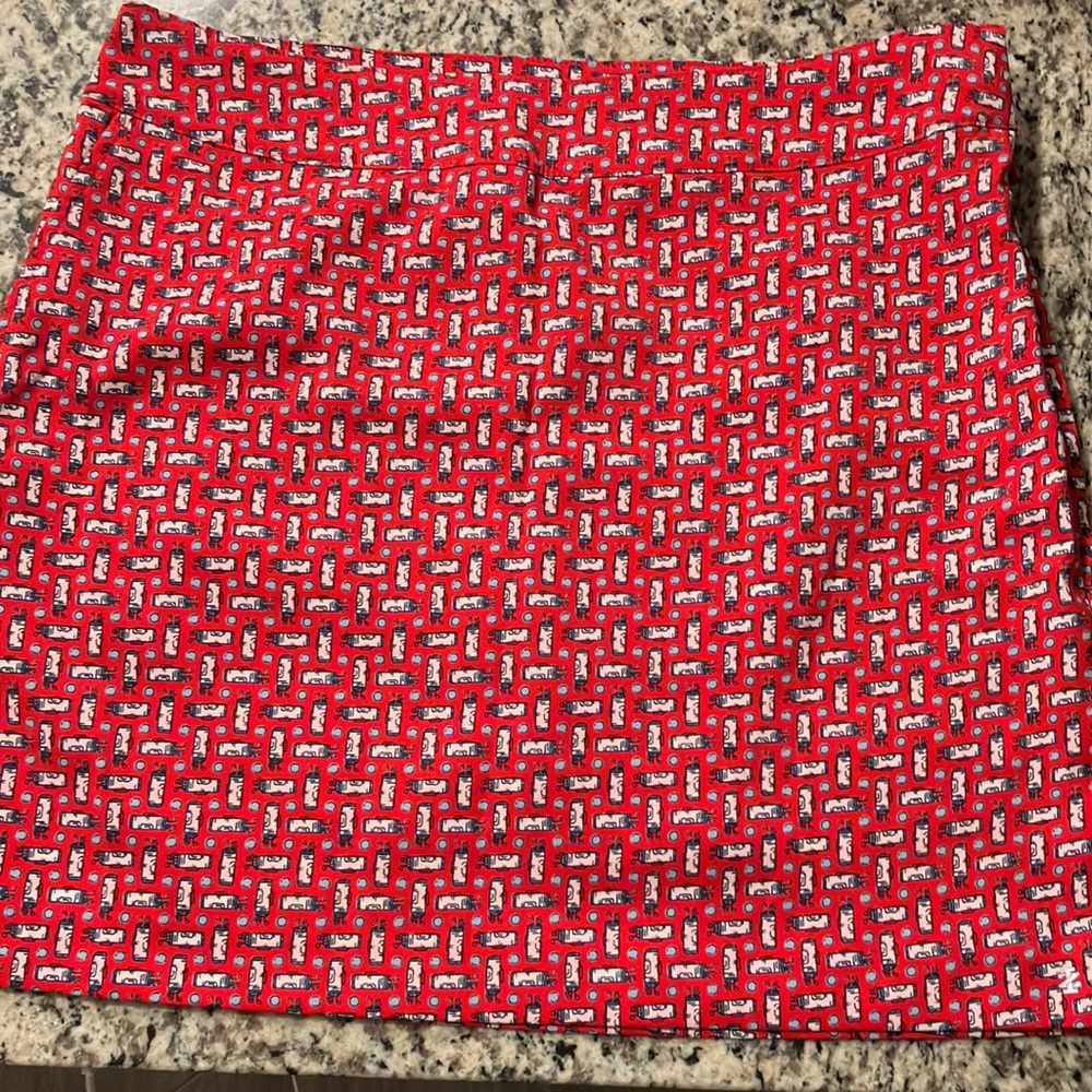 Izod golf skort, golf bag and ball pattern, Red, tags on